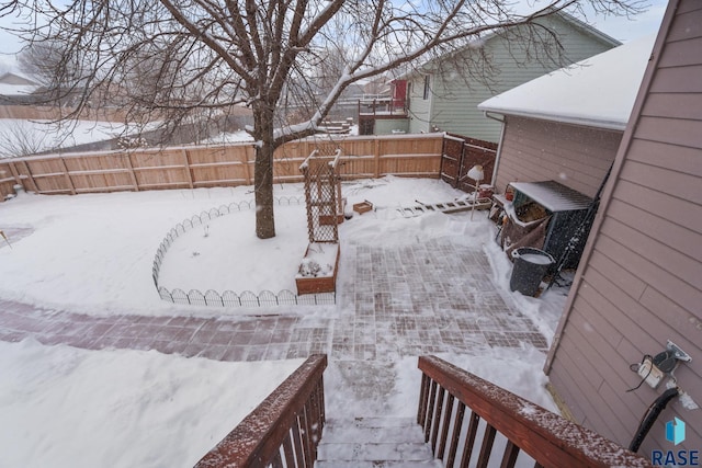 view of yard covered in snow