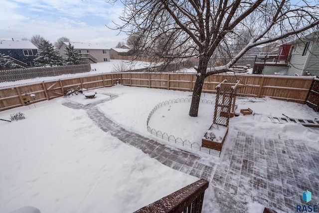 view of yard covered in snow