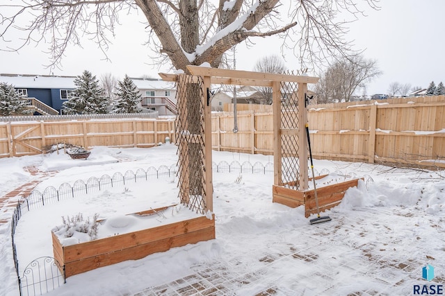 view of yard covered in snow