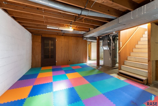 basement featuring heating unit