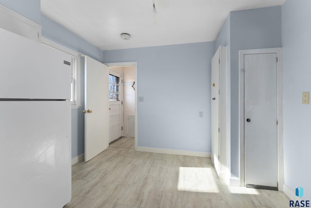 hall featuring light hardwood / wood-style floors