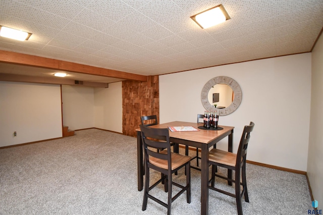 view of carpeted dining area