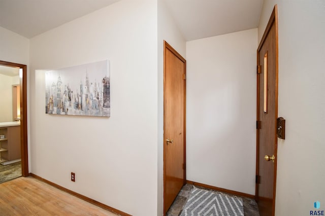 hallway featuring light wood-type flooring