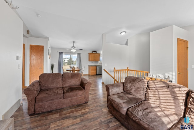 living room with ceiling fan, lofted ceiling, and dark hardwood / wood-style floors