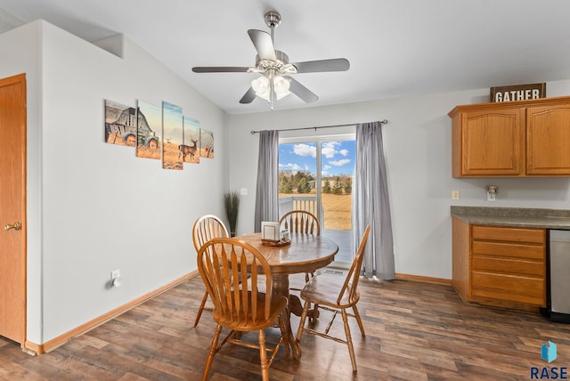 dining area with dark hardwood / wood-style floors and ceiling fan