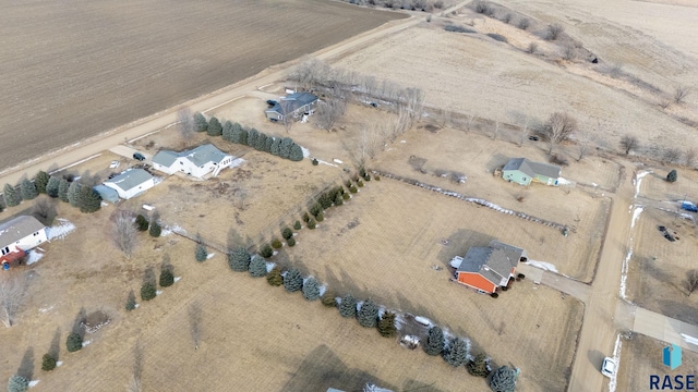 birds eye view of property featuring a rural view