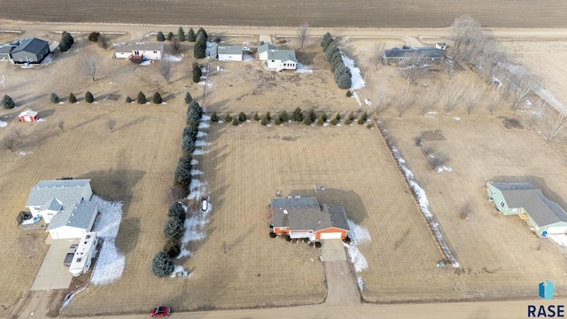 birds eye view of property featuring a rural view