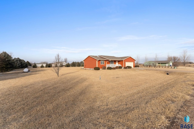 view of yard featuring a garage