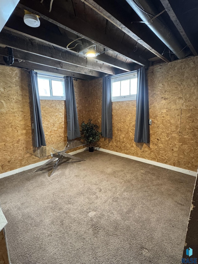 basement with carpet and a healthy amount of sunlight