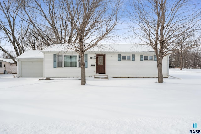 single story home with a garage