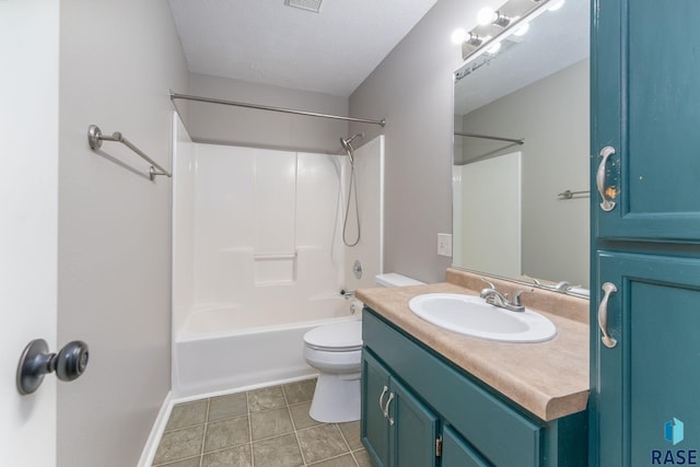 full bathroom featuring shower / bathing tub combination, tile patterned flooring, vanity, toilet, and a textured ceiling