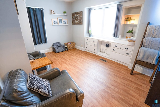 living area with light wood-type flooring