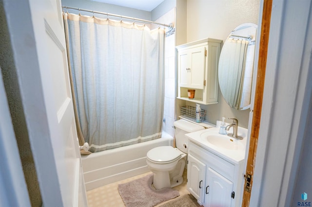 full bathroom with vanity, shower / bath combo, and toilet