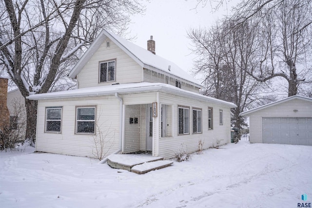 view of front of home with an outbuilding and a garage