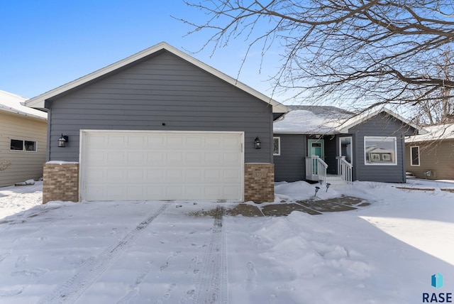 view of front of property featuring a garage