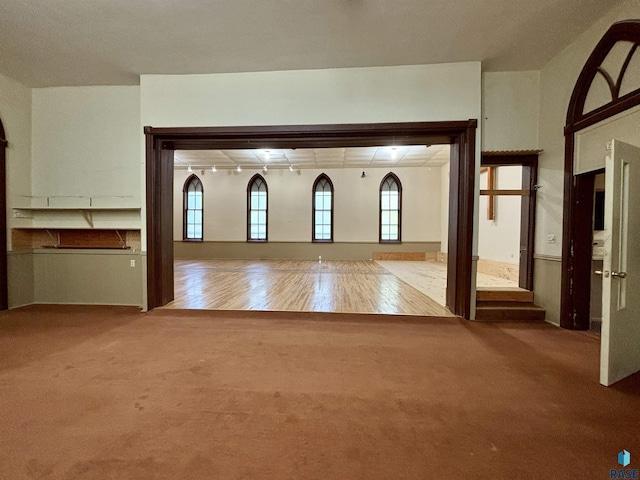 interior space featuring carpet