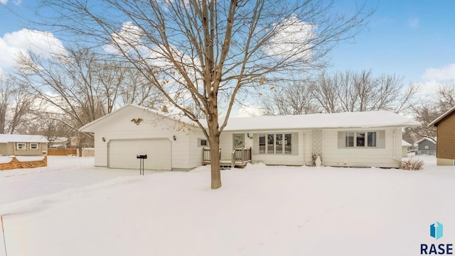 single story home featuring a garage