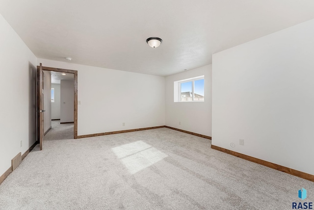 view of carpeted spare room