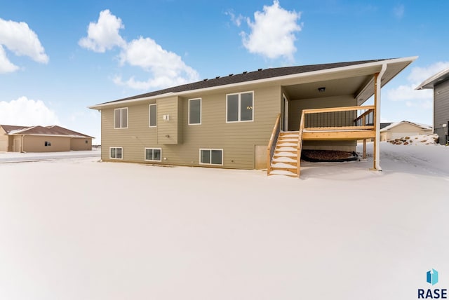 view of snow covered house