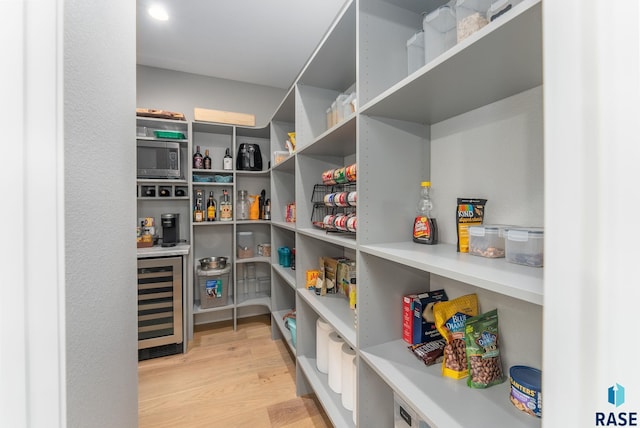 pantry featuring wine cooler