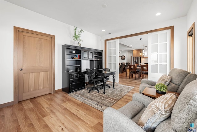 office area with hardwood / wood-style floors