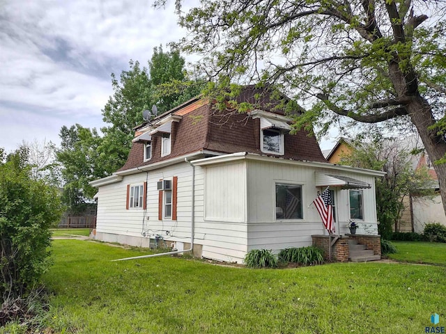 view of front of house with a front yard