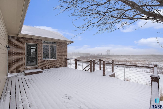 view of snow covered deck