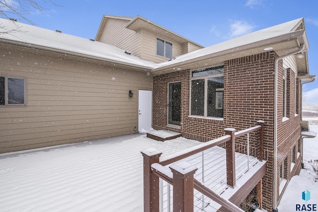 view of snow covered deck