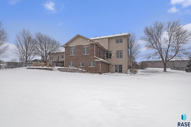 view of snow covered property