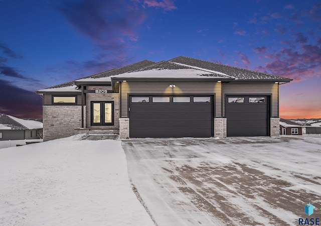 prairie-style home with a garage