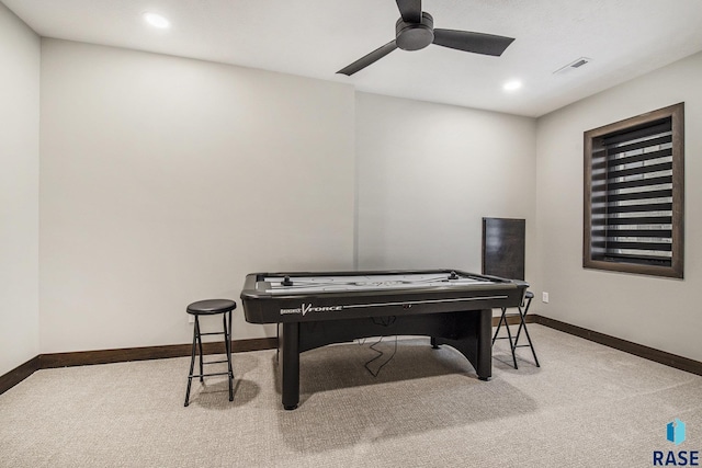 game room with carpet flooring and ceiling fan