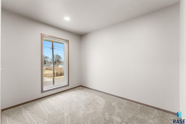 view of carpeted spare room