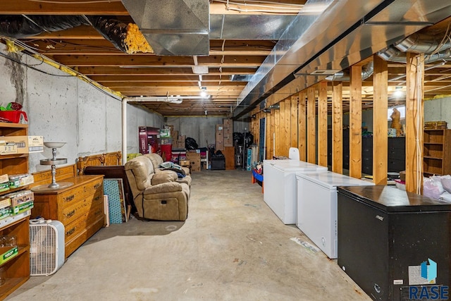 basement with independent washer and dryer and refrigerator