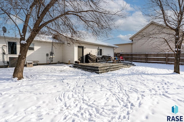 view of snow covered house
