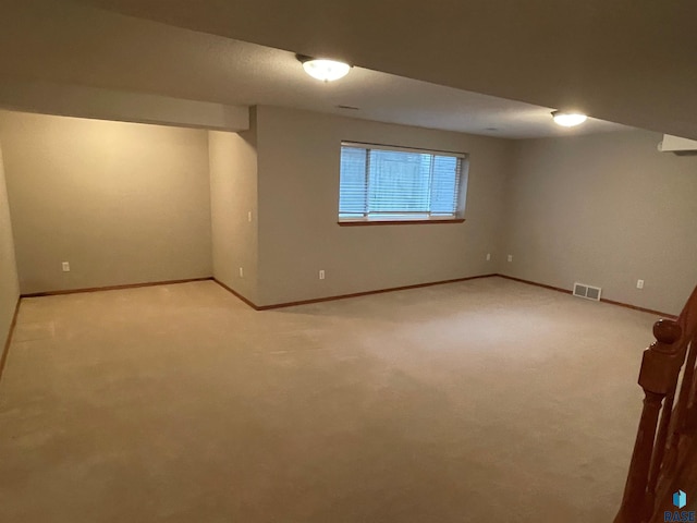 basement with light carpet