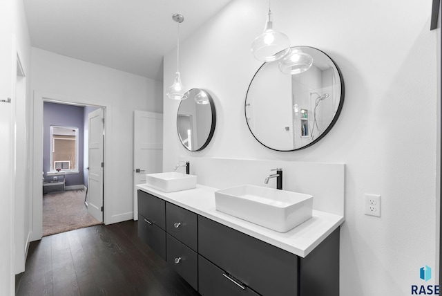 bathroom featuring vanity and hardwood / wood-style flooring