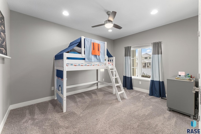 bedroom featuring ceiling fan and carpet floors