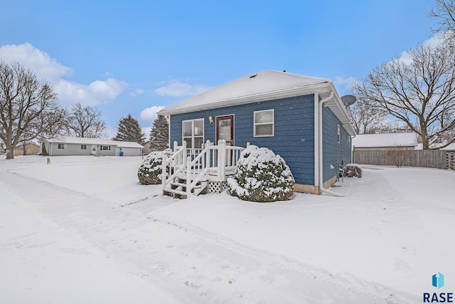 view of snow covered property