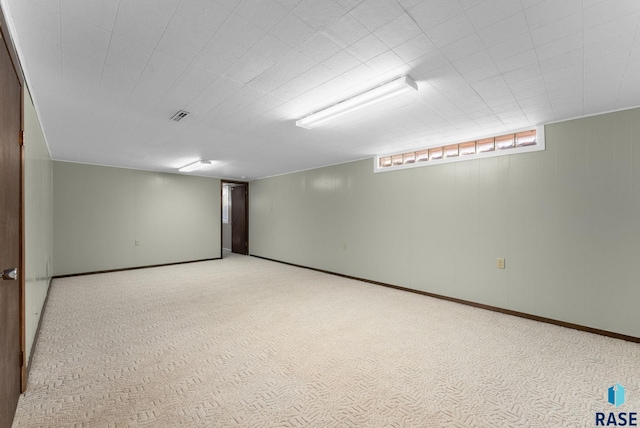 basement with light carpet