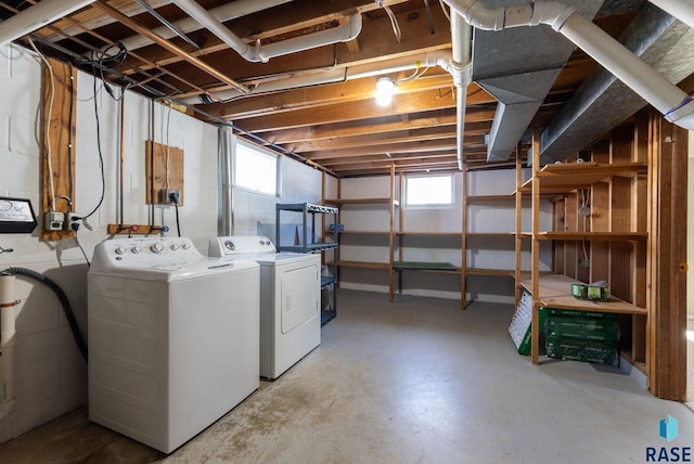 basement with washer and clothes dryer