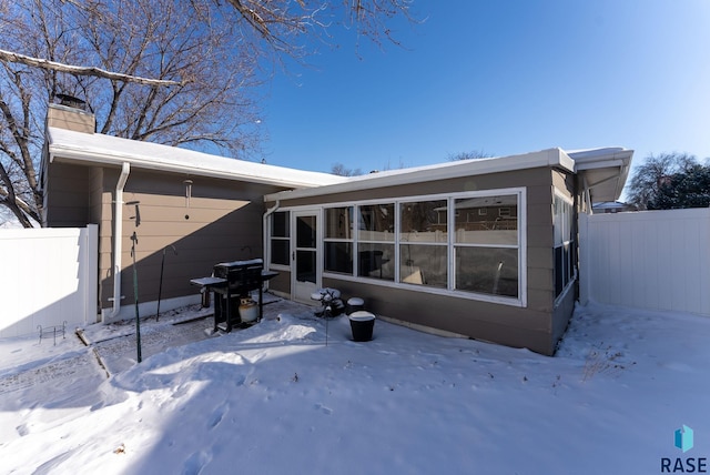 view of snow covered property