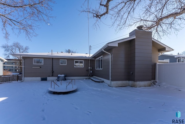 view of snow covered house