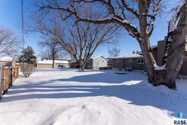 view of yard covered in snow