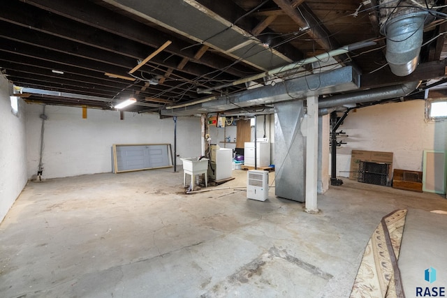 basement with washing machine and dryer