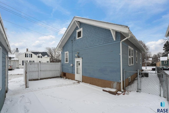 view of snow covered property