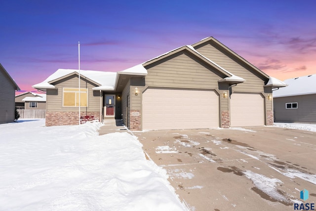 view of front of property featuring a garage