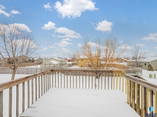 view of snow covered deck