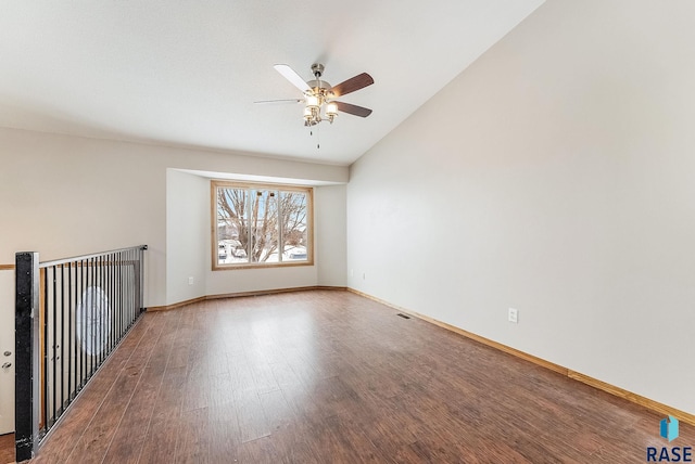 unfurnished room featuring wood-type flooring, vaulted ceiling, and ceiling fan