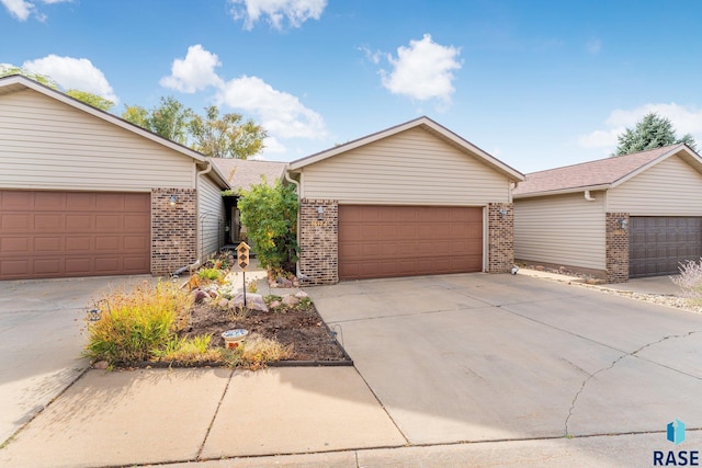 ranch-style home with a garage