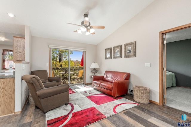 living room featuring hardwood / wood-style floors, lofted ceiling, and ceiling fan